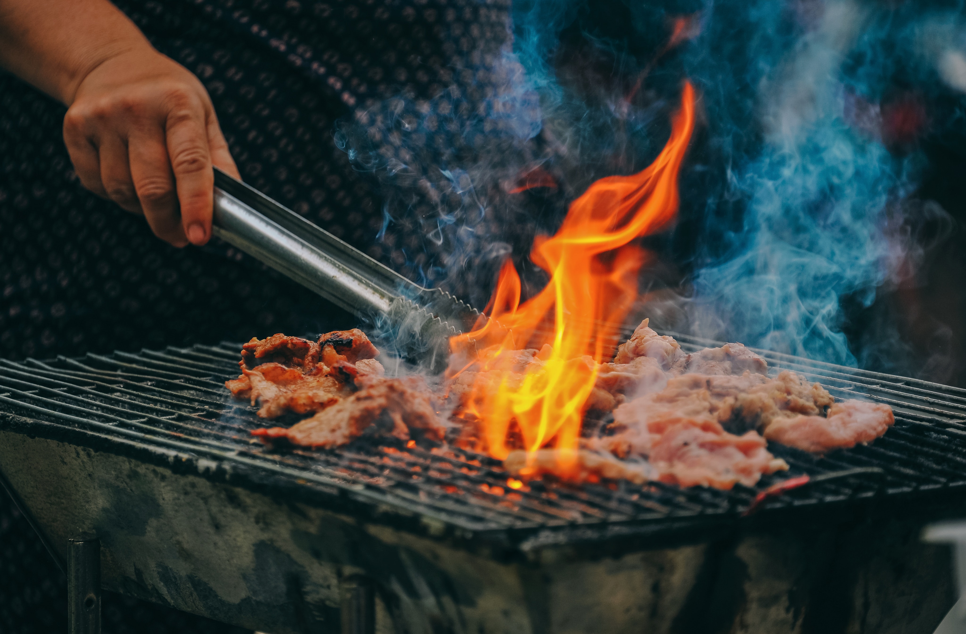 Close Up Photo Of Man Cooking Meat 1482803